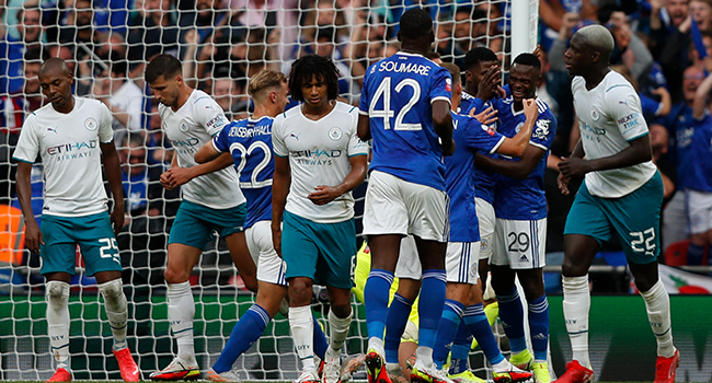 Leicester City players celebrate after Leicester City's Nigerian striker Kelechi Iheanacho scored the opening goal during the English FA Community Shield football match between Manchester City and Leicester City at Wembley Stadium in north London on August 7, 2021. Adrian DENNIS / AFP