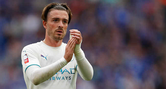 Manchester City's English midfielder Jack Grealish applauds the fans at the end of the English FA Community Shield football match between Manchester City and Leicester City at Wembley Stadium in north London on August 7, 2021. Adrian DENNIS / AFP