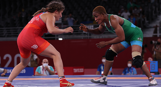 Nigeria's Blessing Oborududu (blue) wrestles Azerbaijan's Elis Manolova in their women's freestyle 68kg wrestling early round match during the Tokyo 2020 Olympic Games at the Makuhari Messe in Tokyo on August 2, 2021. Jack GUEZ / AFP