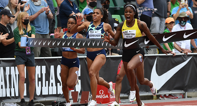Elaine THOMPSON-HERAH from Jamaica crosses the finish line of the 100m women final at the Diamond League track and field meeting in Eugene on August 21, 2021. Andy NELSON / Diamond League AG