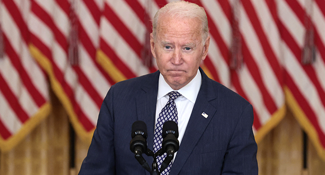 U.S. President Joe Biden gestures as delivers remarks on the U.S. military’s ongoing evacuation efforts in Afghanistan from the East Room of the White House on August 20, 2021 in Washington, DC. Anna Moneymaker/Getty Images/AFP