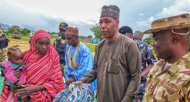 Governor Babagana Zulum received Chibok schoolgirl Hassana Adamu in Gwoza, on August 14, 2021.