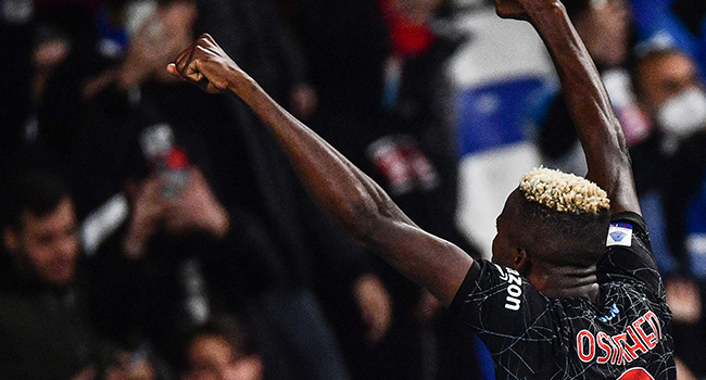 Napoli's Nigerian forward Victor Osimhen celebrates after opening the scoring during the Italian Serie A football match between Napoli and Torino on October 17, 2021 at the Diego-Maradona stadium in Naples. Filippo MONTEFORTE / AFP