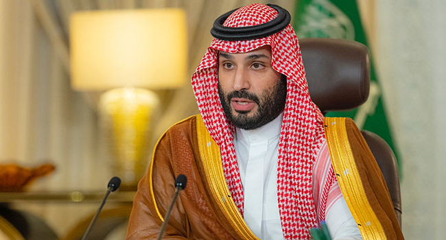 A handout picture provided by the Saudi Royal Palace shows Saudi Crown Prince Mohammed bin Salman delivering a speech addressing the Saudi Green Initiative opening ceremony in the capital Riyadh on October 23, 2021. BANDAR AL-JALOUD / AFP / Saudi Royal Palace