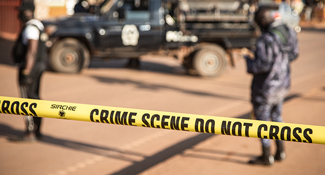 A crime scene following a bomblast last night is secured by the Ugandan police in Kampala on October 24, 2021. Badru KATUMBA / AFP