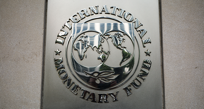 In this file photo taken on October 07, 2021 the seal of the International Monetary Fund is seen outside of its headquarters in Washington, DC. MANDEL NGAN / AFP