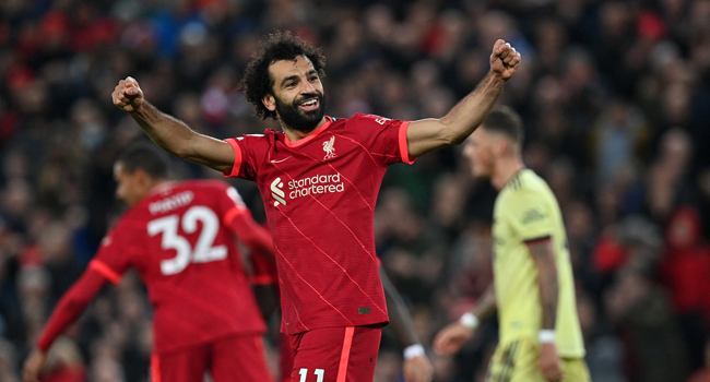 Liverpool's Egyptian midfielder Mohamed Salah celebrates scoring their third goal during the English Premier League football match between Liverpool and Arsenal at Anfield in Liverpool, north west England on November 20, 2021. Paul ELLIS / AFP