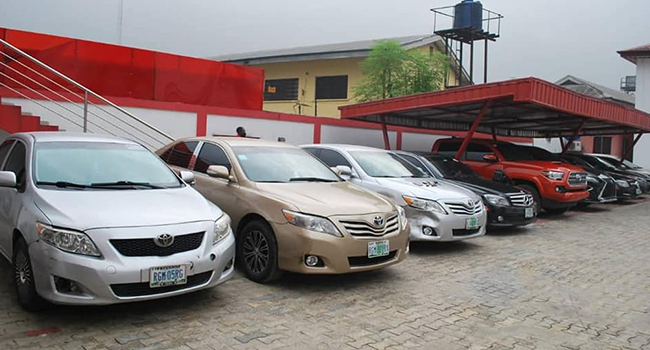 This photo shows cars retrieved by the EFCC from alleged Internet criminals.