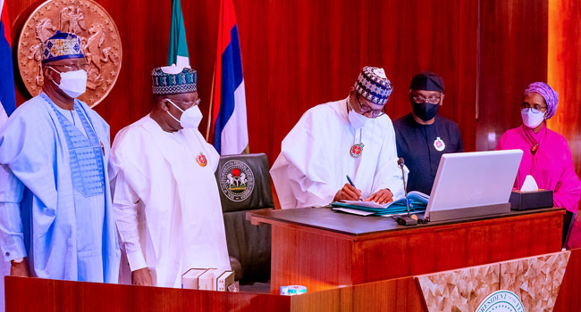 Buhari Signs 2022 Budget, Decries Changes Made By NASS