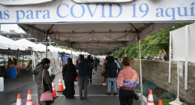 WHO warns of Covid-19 ‘Tsunami’ as Omicron fuels record surges 6 COVID 19 Testing line