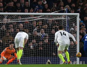 Chelsea's Italian midfielder Jorginho (R) scores their second goal from the penalty spot during the English Premier League football match between Chelsea and Leeds United at Stamford Bridge in London on December 11, 2021. Glyn KIRK / AFP