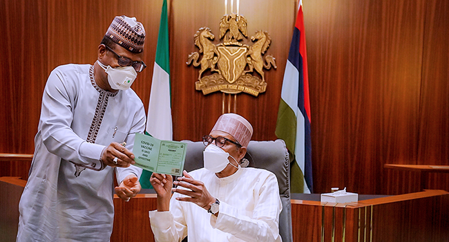 President Buhari receives his Covid-19 Booster Dose at the State House in Abuja on December 21, 2021. Bayo Omoboriowo/State House