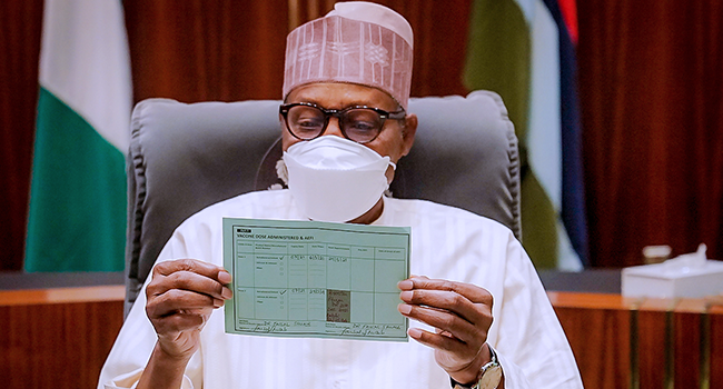 President Buhari receives his Covid-19 Booster Dose at the State House in Abuja on December 21, 2021. Bayo Omoboriowo/State House