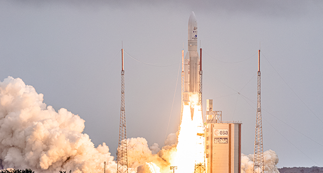 Arianespace's Ariane 5 rocket with NASA’s James Webb Space Telescope onboard lifts up from the launchpad, at the Europe’s Spaceport, the Guiana Space Center in Kourou, French Guiana, on December 25, 2021. Jody Amiet / AFP