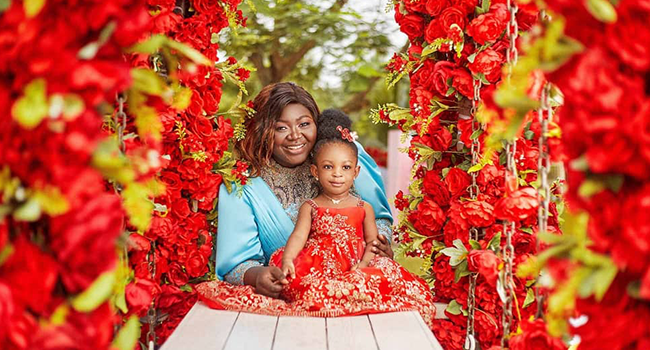 Emmanuela Oshiogwe with her daughter.