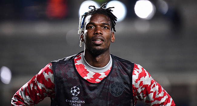 This file photo taken on November 02, 2021 shows Manchester United's France's midfielder Paul Pogba warming up ahead of the UEFA Champions League group F football match between Atalanta and Manchester United at the Azzurri d'Italia stadium, in Bergamo. Marco BERTORELLO / AFP