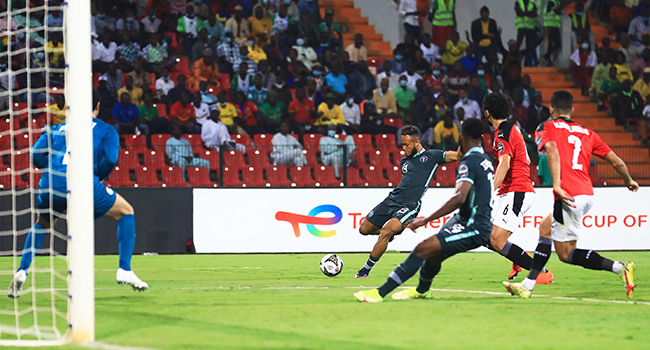 Nigeria's forward Chidera Ejuke (C) kicks the ball during the Group D Africa Cup of Nations (CAN) 2021 football match between Nigeria and Egypt at Stade Roumde Adjia in Garoua on January 11, 2022. Daniel BELOUMOU OLOMO / AFP