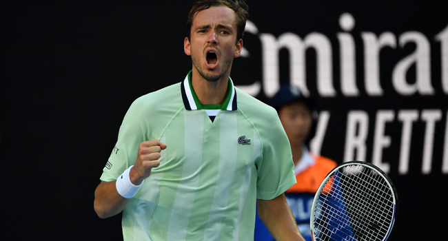 Russia's Daniil Medvedev reacts after a point against Netherlands' Botic Van de Zandschulp during their men's singles match on day six of the Australian Open tennis tournament in Melbourne on January 22, 2022. Paul Crock / AFP