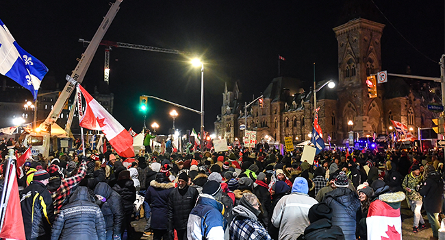 Supporters against vaccines mandates continue to party into the night on February 5, 2022 in Ottawa, Canada. Minas Panagiotakis/Getty Images/AFP