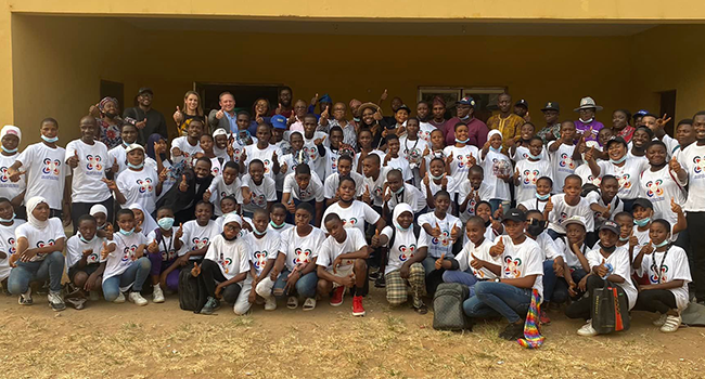 A group photograph with all participating teams during the closing ceremony of the drone soccer competition in Lagos on February 5, 2022.