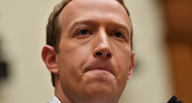 In this file photo taken on October 23, 2019 Facebook Chairman and CEO Mark Zuckerberg testifies before the House Financial Services Committee on "An Examination of Facebook and Its Impact on the Financial Services and Housing Sectors" in the Rayburn House Office Building in Washington, DC. Nicholas Kamm / AFP