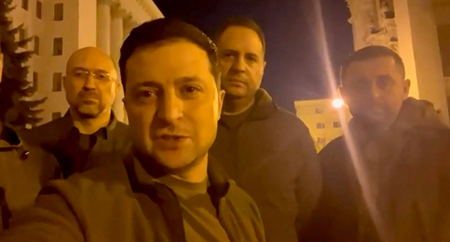 This screen grab taken from a video made available on the Facebook account of the President of Ukraine Volodymyr Zelensky, shows himself speaking face camera on February 25, 2022. FACEBOOK / @Volodymyr Zelensky / AFP