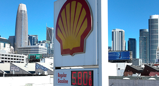 In an aerial view, gas prices nearing $6.00 a gallon are displayed at a Shell gas station on February 23, 2022 in San Francisco, California. Justin Sullivan/Getty Images/AFP