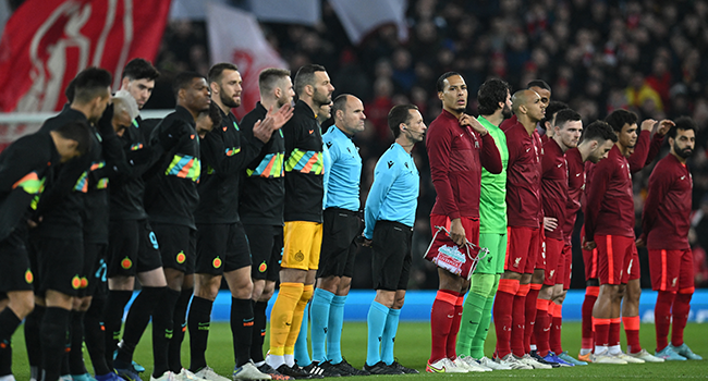 Players line up ahead of the UEFA Champions League round of 16 second leg football match between Liverpool and Inter Milan at Anfield in Liverpool, north west England on March 8, 2022. Paul ELLIS / AFP