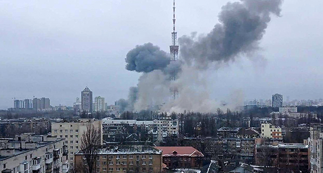 This handout picture released on the Facebook page of the Ukrainian Interior ministry on March 1, 2022 show the smoke after a missile attack targeting the Ukrainian capital’s television centre in Kyiv. UKRAINIAN INTERIOR MINISTRY PRESS SERVICES / AFP