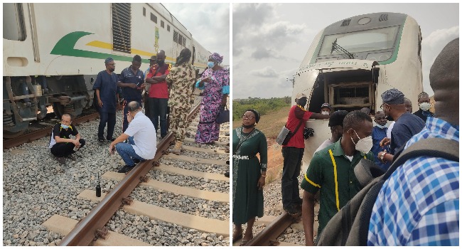 This combination of photos posted by Twitter user King Isaiah Obadare on March 10, 2022, shows a stationary train in the middle of nowhere,