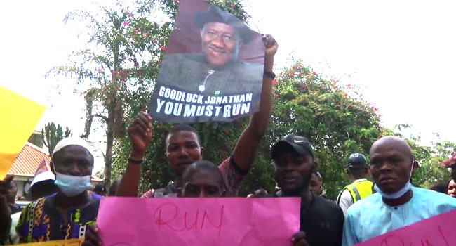 ‘Run For President’, Protesters Storm Jonathan’s Abuja Office