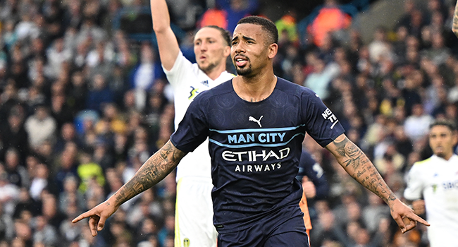 Manchester City's Brazilian striker Gabriel Jesus (C) celebrates after scoring their third goal during the English Premier League football match between Leeds United and Manchester City at Elland Road in Leeds, northern England on April 30, 2022. Oli SCARFF / AFP