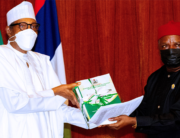 President Muhammadu Buhari receives the new revenue formula from the Chairman of the Revenue Mobilization Allocation and Fiscal Commission, Engr Elisa Mbam at the State House on April 7, 2022. Sunday Aghaeze/State House