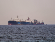 The Liberian-flagged oil tanker Ice Energy (L) transfers crude oil from the Iranian-flagged oil tanker Lana (R) (former Pegas), off the shore of Karystos, on the Island of Evia, on May 29, 2022. Angelos Tzortzinis / AFP