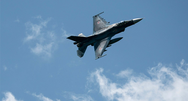 An F-2 fighter jet takes part in a live fire exercise conducted by the Japan Ground Self-Defense Force (JGSDF) at East Fuji Maneuver Area in Gotemba on May 28, 2022. Tomohiro Ohsumi / POOL / AFP