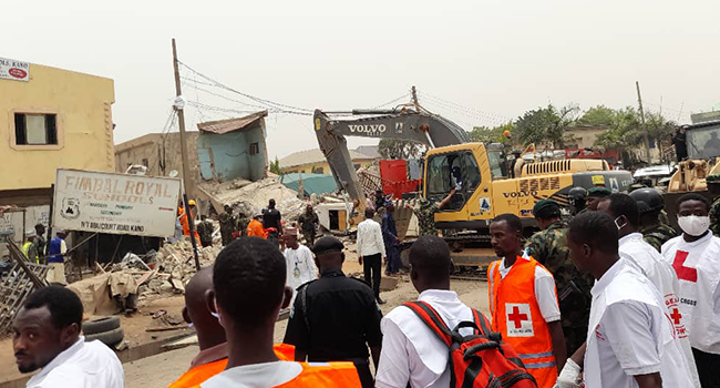 Rescue workers in action after an explosion rocked Aba Road in the Sabon Gari area of Kano on May 17, 2022.