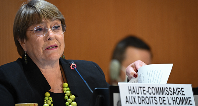 In this file photo taken on February 28, 2022 United Nations High Commissioner for Human Rights Michelle Bachelet delivers a speech at the opening of a session of the UN Human Rights Council in Geneva. Fabrice COFFRINI / AFP