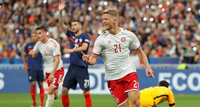 Denmark's forward Andreas Cornelius celebrates after scoring his team's first goal during the UEFA Nations League - League A Group 1 first leg football match between France and Denmark at the Stade de France in Saint-Denis, north of Paris, on June 3, 2022. Geoffroy VAN DER HASSELT / AFP