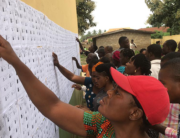 Voters check for their details in a polling unit in Ekiti state on June 18, 2022. Sodiq Adelakun/Channels Television