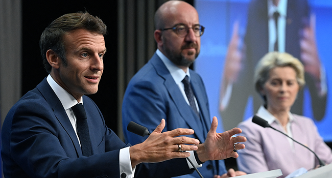 France's President Emmanuel Macron (L), President of the European Council Charles Michel (C) and President of the European Commission Ursula von der Leyen (R) attend a press conference during an European Council in Brussels on June 23, 2022. JOHN THYS / AFP