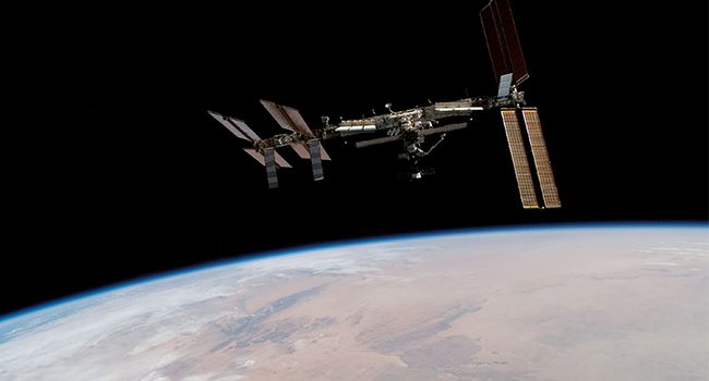 This file photo provided by NASA on February 19, 2008 shows the International Space Station as seen from the US space shuttle Atlantis on February 18, 2008. Photo by Handout / NASA / AFP