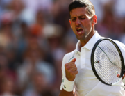 Serbia's Novak Djokovic celebrates beating Britain's Cameron Norrie during their men's singles semi final tennis match on the twelfth day of the 2022 Wimbledon Championships at The All England Tennis Club in Wimbledon, southwest London, on July 8, 2022. (Photo by Adrian DENNIS / AFP)