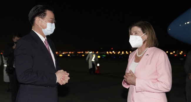 US House Speaker Nancy Pelosi (R) being welcomed by Taiwanese Foreign Minister Joseph Wu (L) after landing at Songshan Airport in Taipei, Taiwan on August 2, 2022.