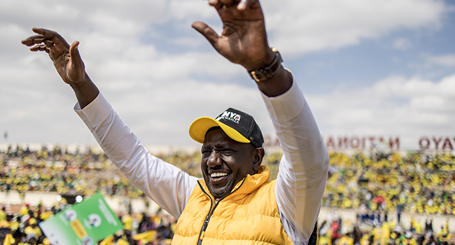 In this file photo taken on August 06, 2022 Kenya's Deputy President and presidential candidate William Ruto of Kenya Kwanza (Kenya first) political party gestures during the rally on the final day of campaigning at the Nyayo National Stadium in Nairobi ahead of Kenya's general election scheduled for August 9, 2022. (Photo by MARCO LONGARI / AFP)