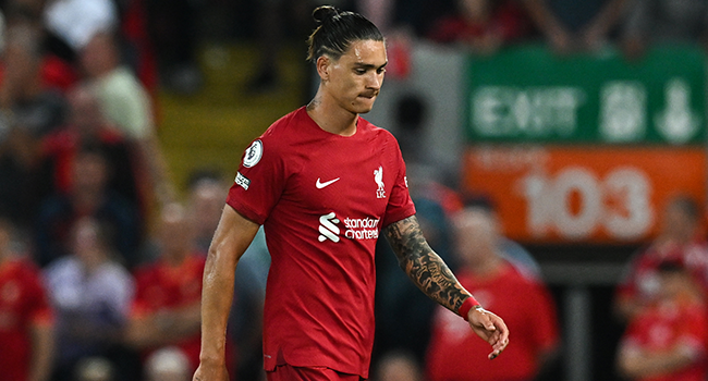 Liverpool's Uruguayan striker Darwin Nunez reacts as he leaves the pitch after being sent off by the referee during the English Premier League football match between Liverpool and Crystal Palace at Anfield stadium, in Liverpool, north west England on August 15, 2022. (Photo by Paul ELLIS / AFP)