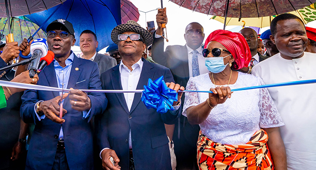 Lagos State Governor, Babajide Sanwo-Olu and Rivers State Governor, Nyesom Wike at a flyover commissioning in Port Harcourt on August 8, 2022.