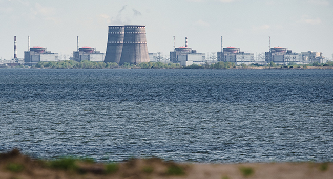 In this file photo taken on April 27, 2022 a general view shows the Zaporizhzhia nuclear power plant, situated in the Russian-controlled area of Enerhodar, seen from Nikopol. (Photo by Ed JONES / AFP)