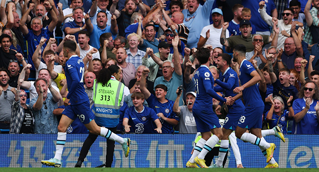 Chelsea's German midfielder Kai Havertz (L) celebrates after scoring his team second goal during the English Premier League football match between Chelsea and West Ham United at Stamford Bridge in London on September 3, 2022. (Photo by Adrian DENNIS / AFP)