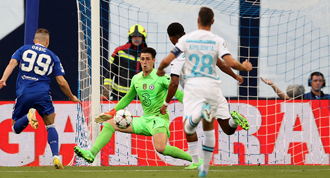 Dinamo Zagreb's Croatian forward Mislav Orsic (L) scores a goal during the UEFA Champions League Group E football match between Dinamo Zagreb (CRO) and Chelsea (ENG) at The Maksimir Stadium in Zagreb on September 6, 2022. (Photo by Damir Sencar / AFP)