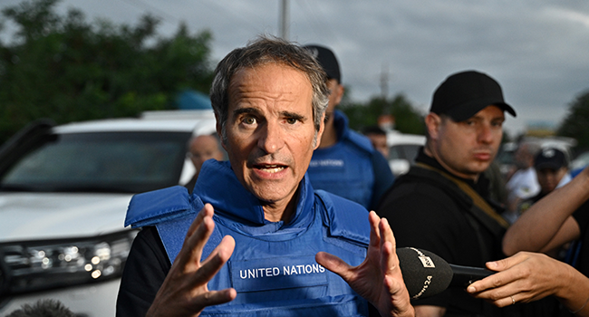 International Atomic Energy Agency (IAEA) chief Rafael Grossi talks to the press on a road outside Zaporizhzhia city, after his visit to the Russian-held Zaporizhzhia nuclear power plant in southern Ukraine on September 1, 2022, amid the Russian invasion of Ukraine. (Photo by Genya SAVILOV / AFP)